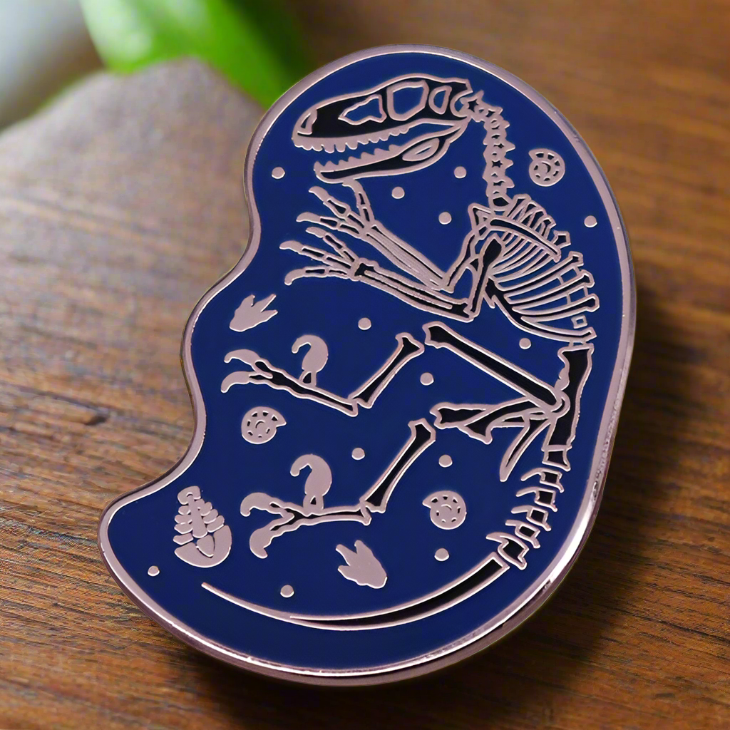 Velociraptor Skeleton Blue Enamel Pin